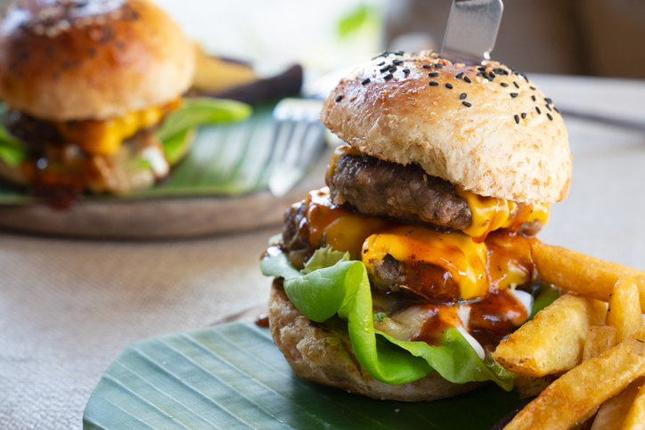 Two homemade beef burgers with mushrooms,