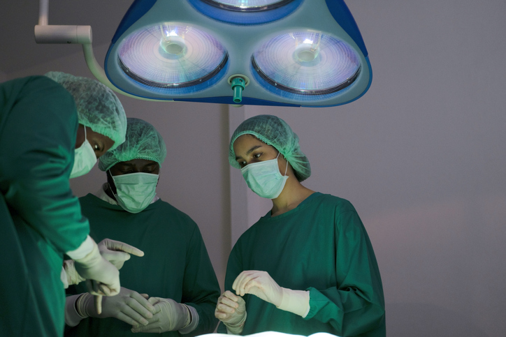 surgeons are working at operating room.