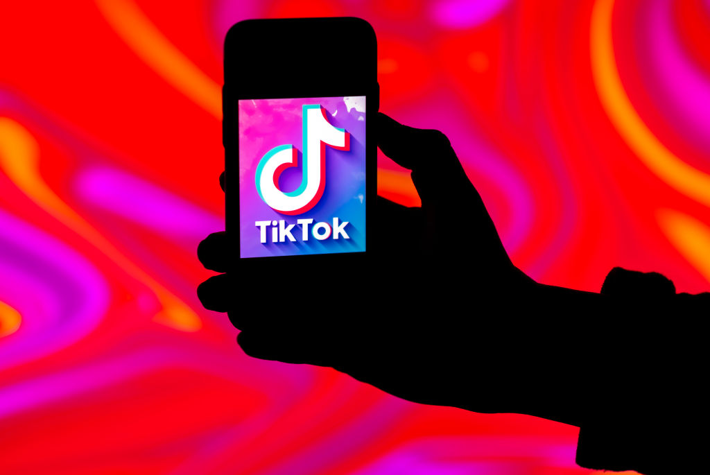In this photo illustration, the TikTok logo is seen...