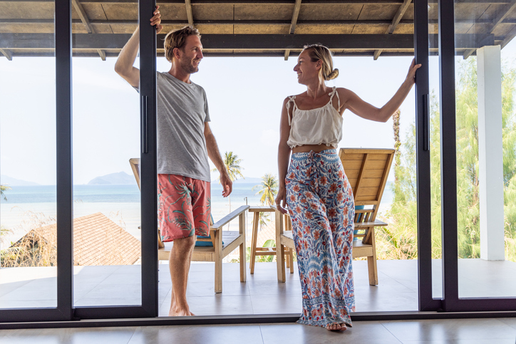 Couple on Balcony with Ocean View