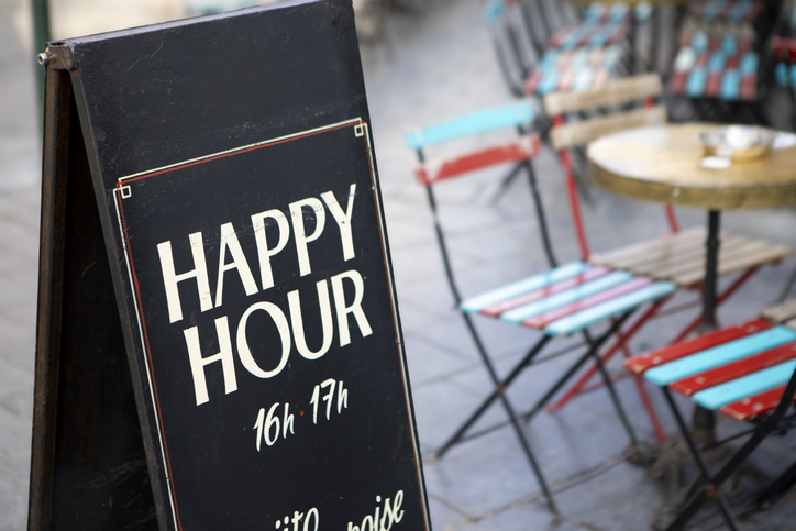 Sign advertising Happy Hour