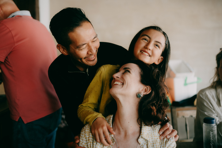 Happy family with one young daughter