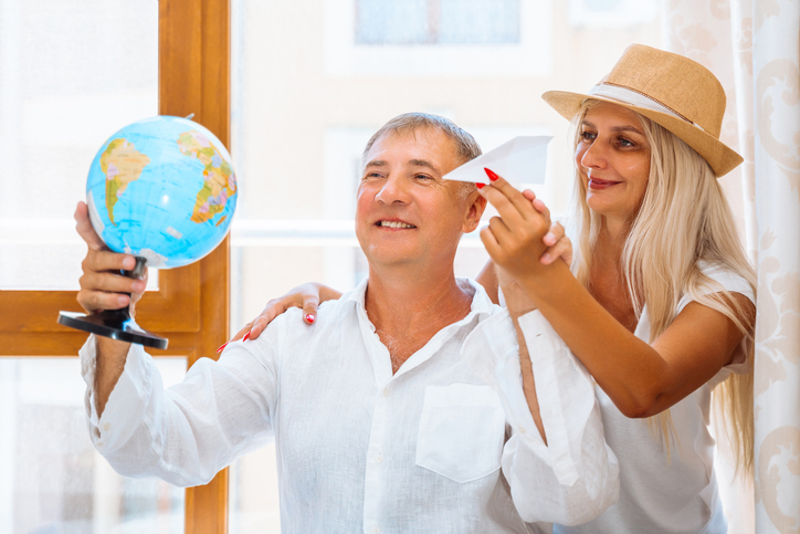 Happy couple chooses destination for their next trip