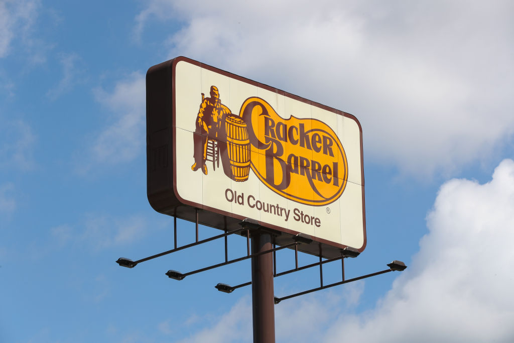 The logo for Cracker Barrel Old Country Store is seen on a...