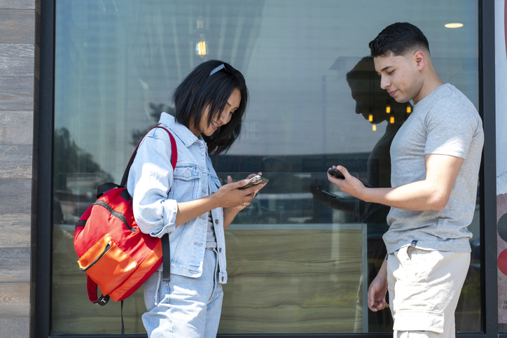 friends chatting on the cell phone